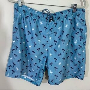Broken Threads sz lg youth size ina light blue with Palm Trees and Flamingos